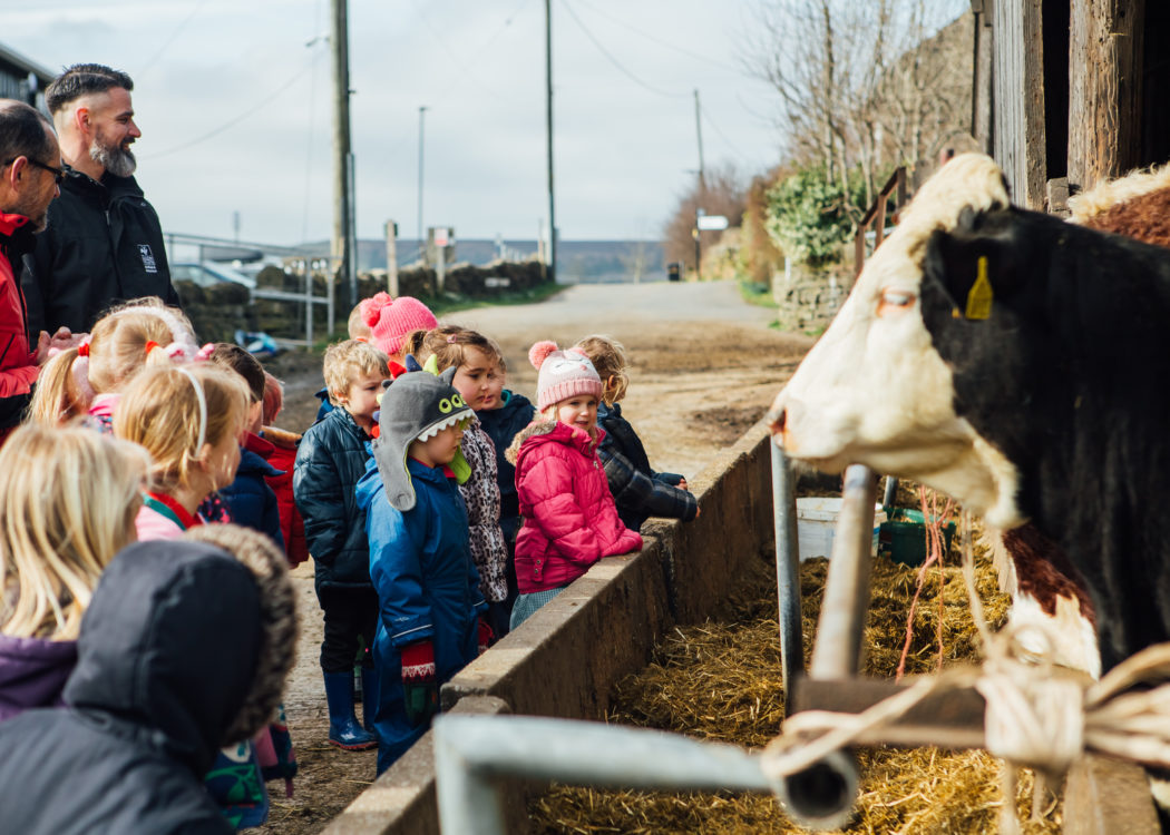 Children enjoying a day out at Our Cow Molly