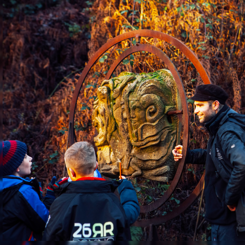 Children investigating sculptures at Stoneface creative