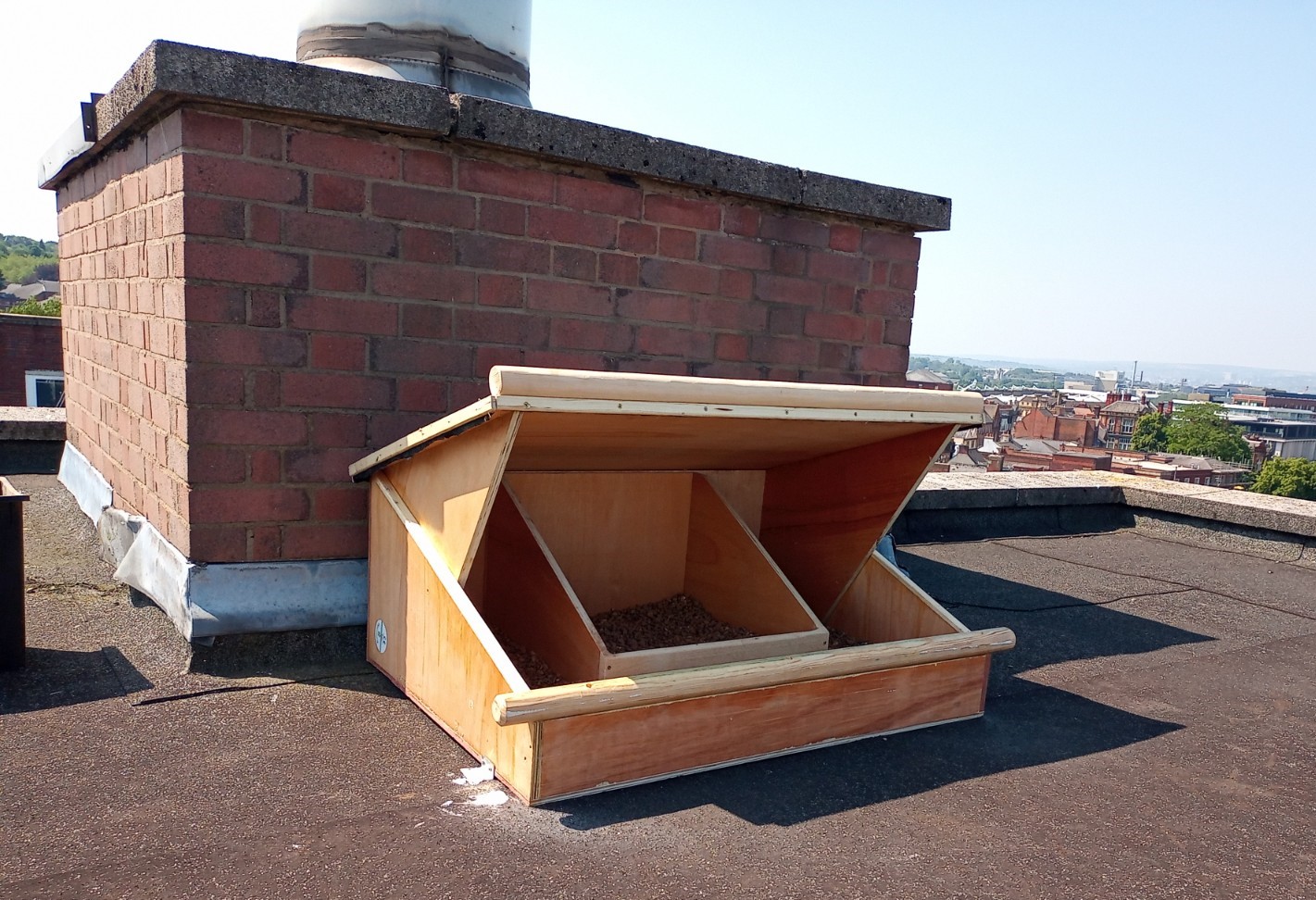 The peregrine nest box on top of one of the buildings at Rotherham College