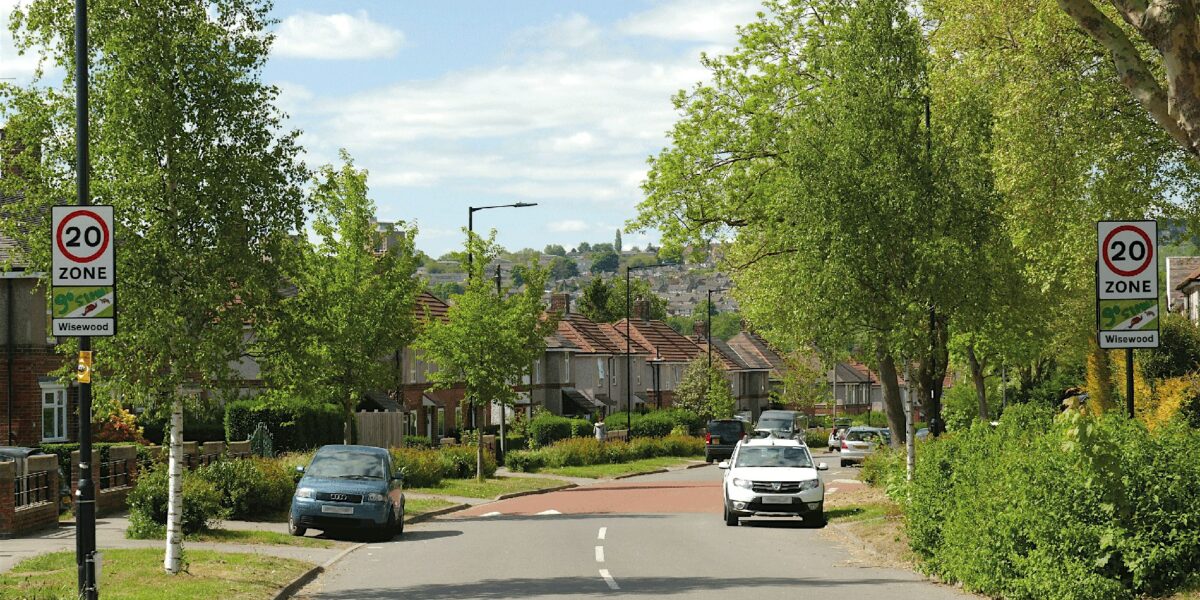 A Sheffield suburban street lined with trees and parked cars. Photo: Sheffield Street Tree Partnership