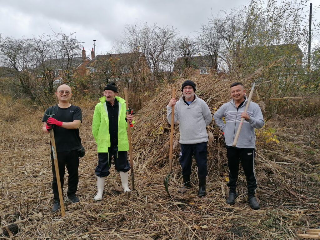 Volunteering at the new Swinton Nature reserve pond 