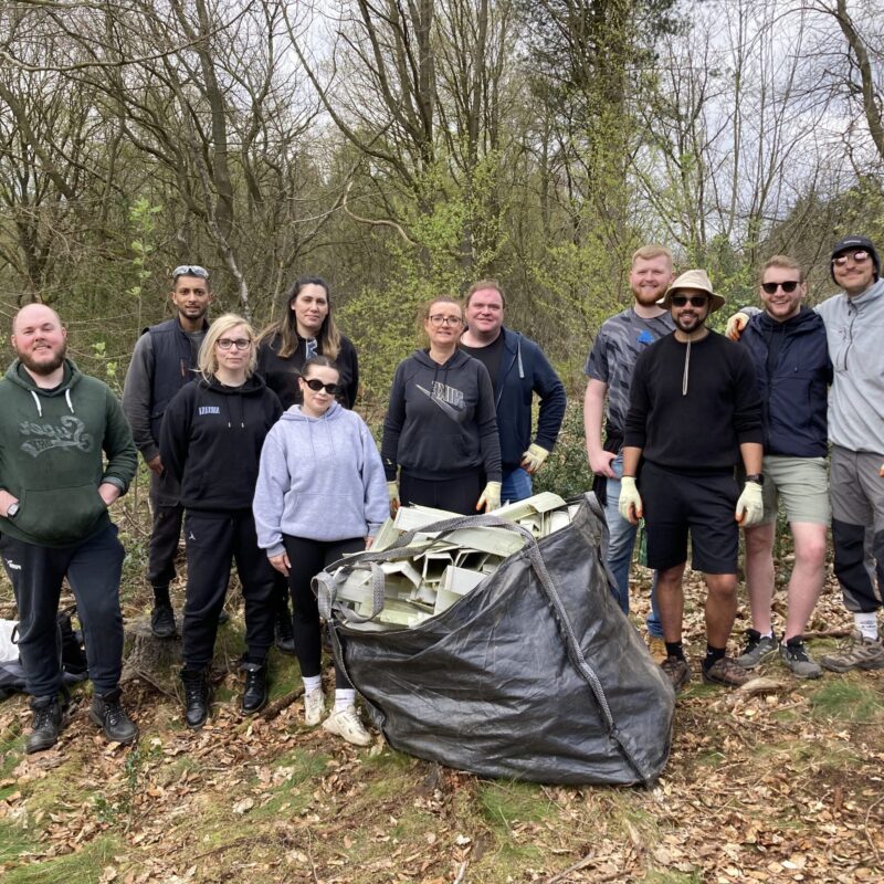 Aviva clearing tree guards with Sheffield and Rotherham Wildlife Trust