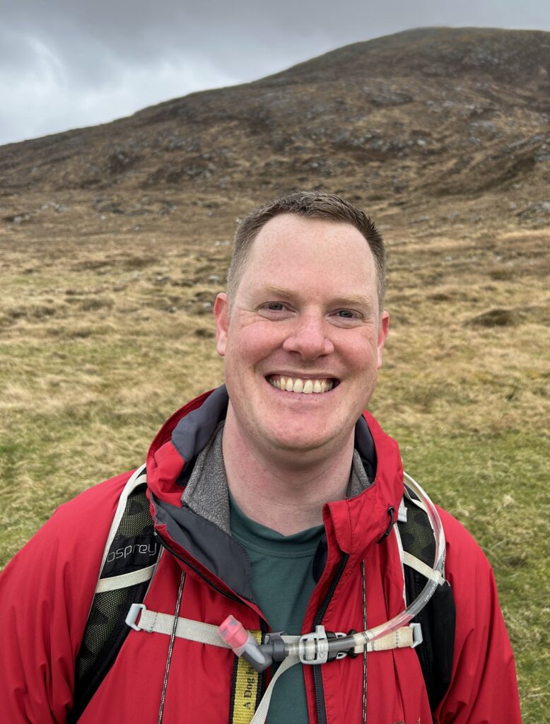 Ed Tripp, our new Chief Executive, shows a broad smile stood outside